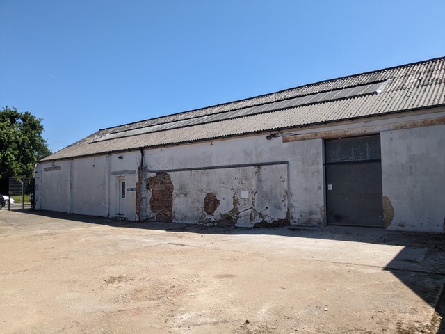 285 Stoughton Road warehouse exterior as it currently looks, before refurbishment